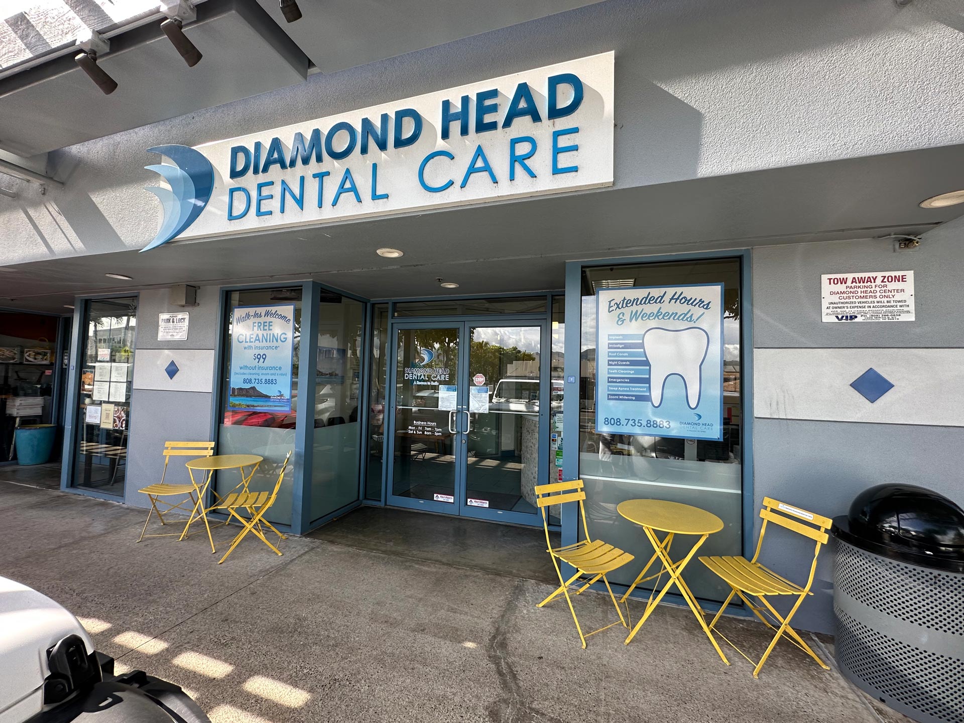 The image shows a storefront with a sign that reads Diamond Head Dental Care above a door, indicating that this is a dental care facility.