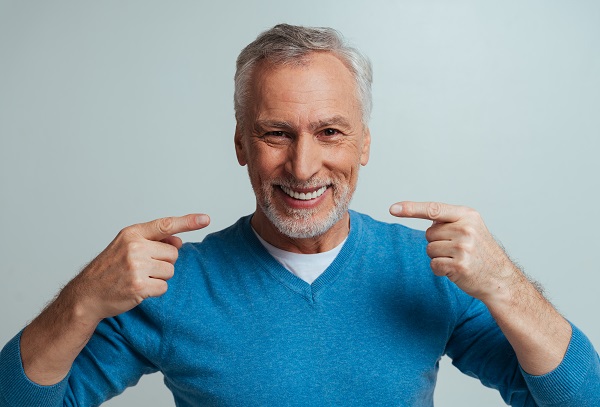 Shortening The Time For Getting Dental Implants: Extraction, Placement And Restoration